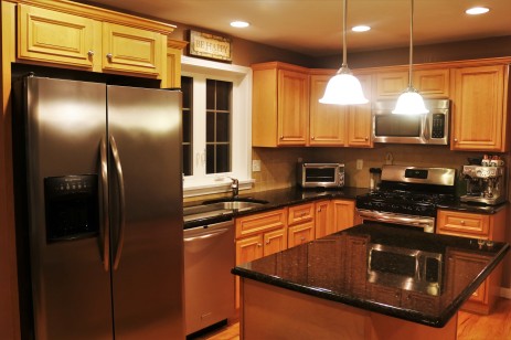 warm granite and stainless kitchen
